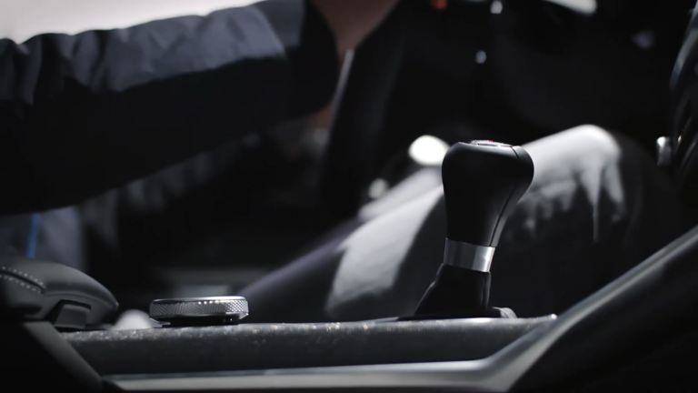 A Close-Up of The Gear Shifter in A BMW M Car, Highlighting the Manual Transmission