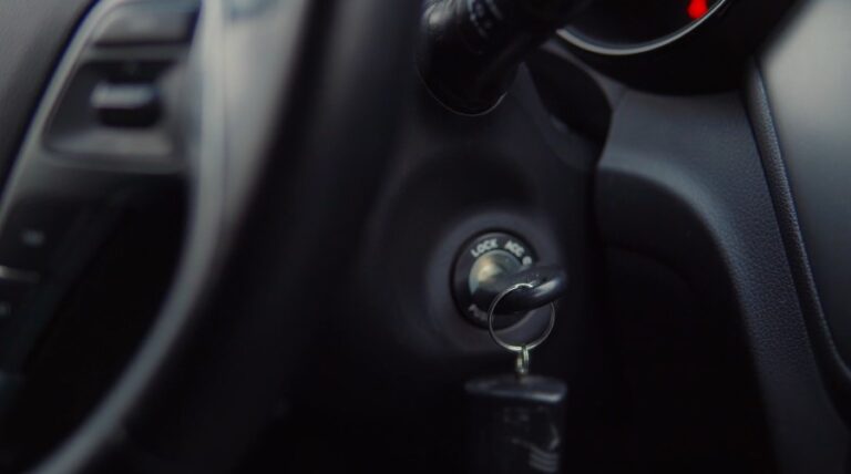 Close-up of a vehicle's ignition switch and key