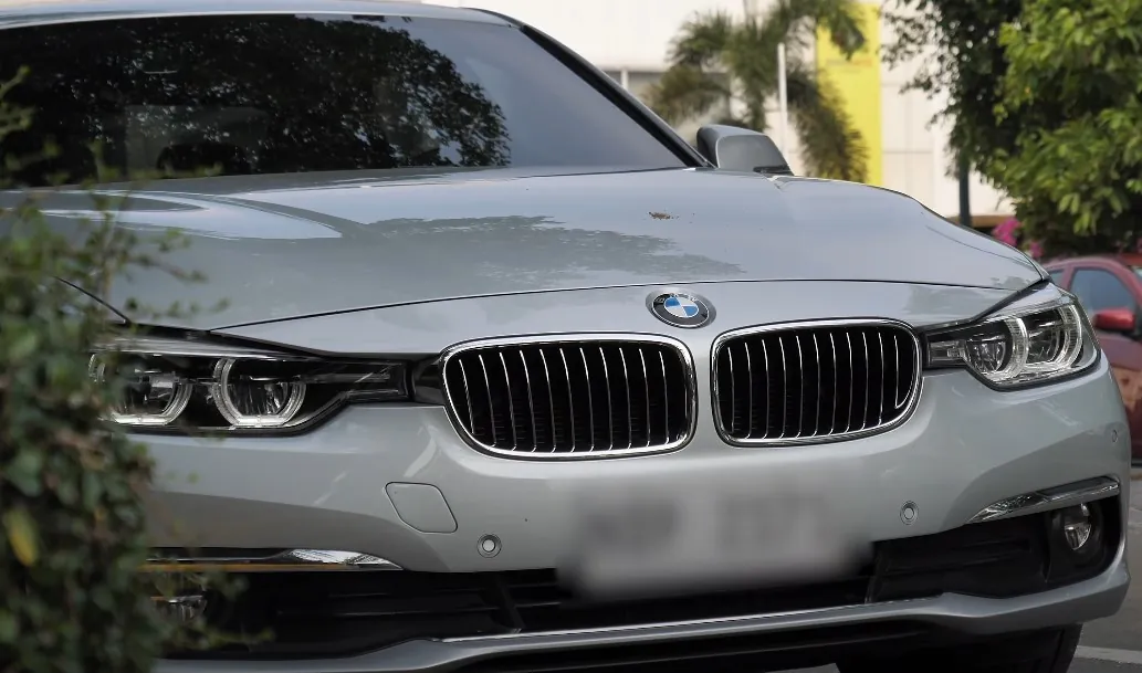 Sleek silver BMW 3 Series, front-end detail