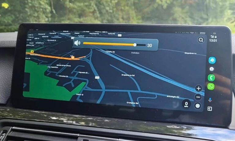 A car navigation system displays a route map