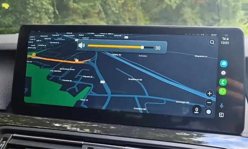 A car navigation system displays a route map