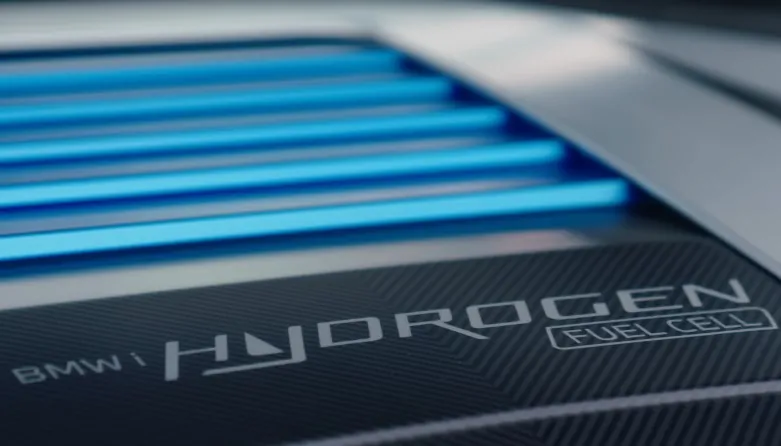 Close-up of the BMW hydrogen cell logo on a car's hood