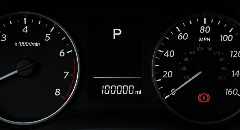 Vehicle's odometer displays 100,000 miles