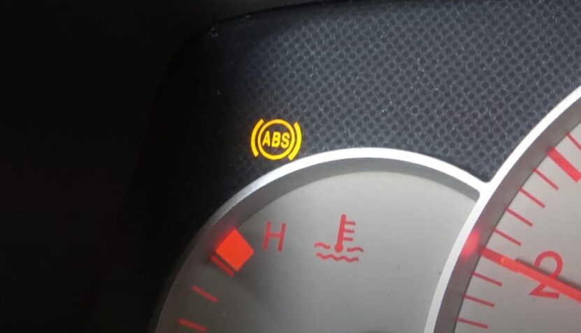 Close up view of ABS warning light on a car dashboard