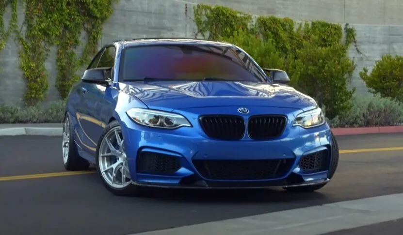 BMW M2 sports car displayed in a striking blue color