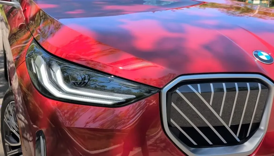 Sleek red BMW exterior with modern headlight design