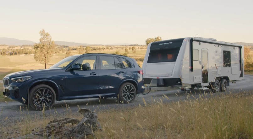 BMW X5 with an attached RV