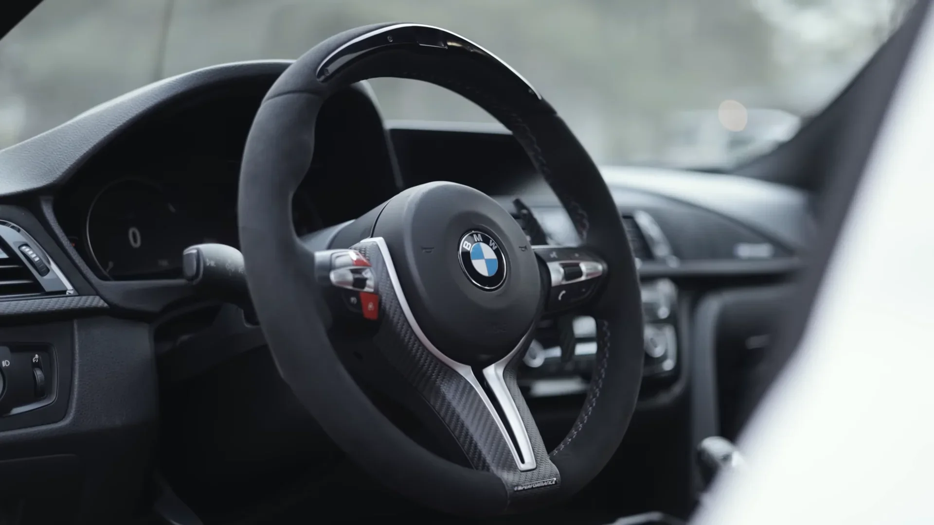 BMW interior with a custom steering wheel