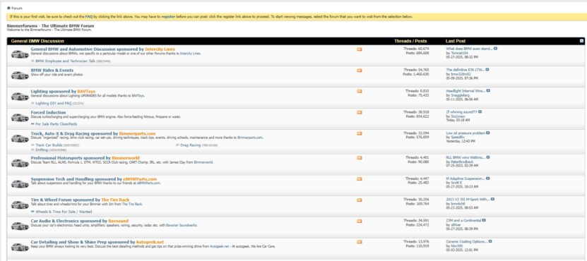 Screenshot of the Bimmerforums online discussion board showing various BMW-related forum topics like lighting, racing, suspension, and app troubleshooting