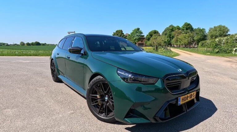 Deep emerald green BMW M5 Touring