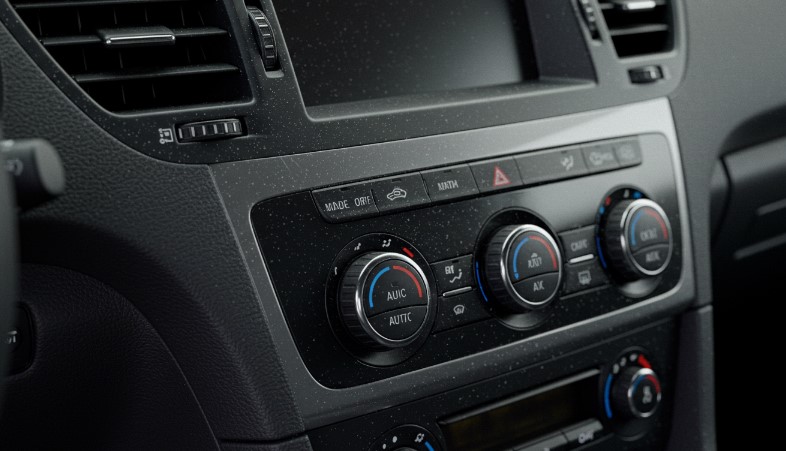 Fine dust motes dance on the dashboard, a subtle reminder of the road's journey