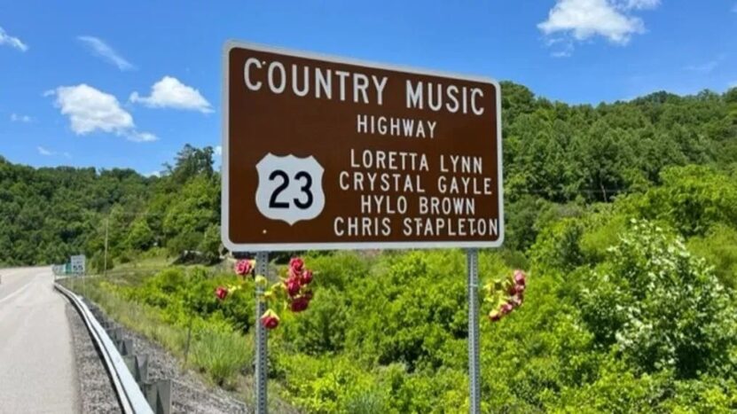 Brown highway sign marking Country Music Highway US 23, honoring famous Kentucky musicians