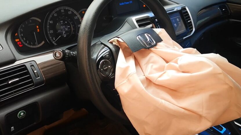 Honda steering wheel with a deployed airbag after a collision