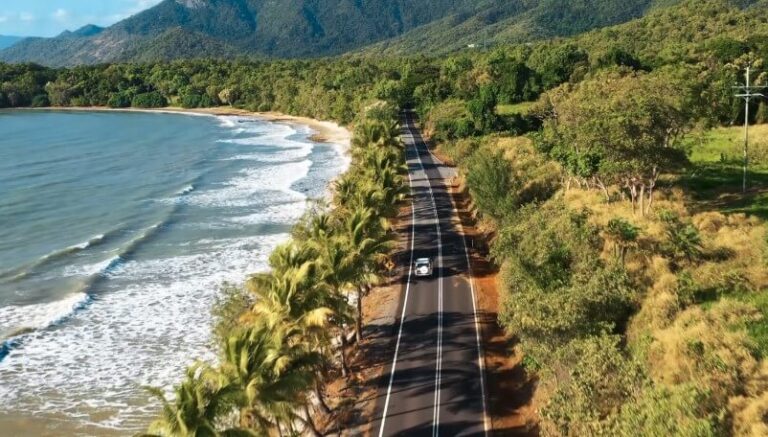 Drone view of a scenic road in Australia by the ocean
