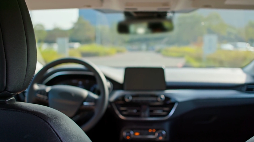 Empty self-driving car interior showing new Texas law requiring permits in 2025