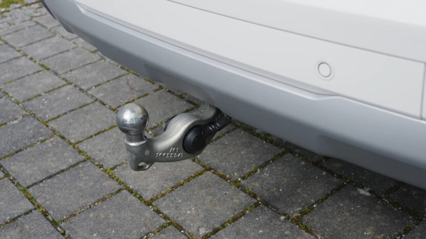 Close-up of a tow hitch mounted on the rear of a vehicle