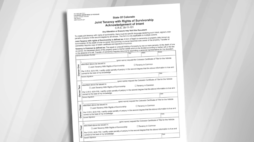 Colorado vehicle title form shown on a desk